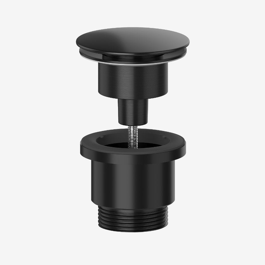 A matt black universal luxury round clicker basin waste made from high quality brass, designed for use with all basins.